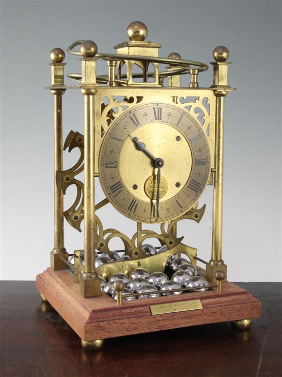 Harding and Bazeley. A lacquered brass spherical weight clock, no.4, 13.5in.